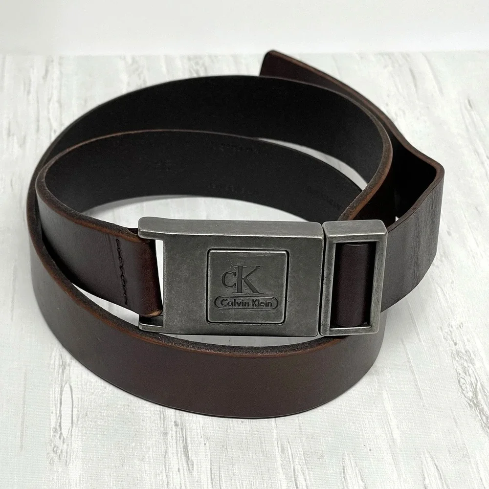 Calvin Klein Men's 36 Debossed Monogram Plaque Belt Brown Timeless Career Staple